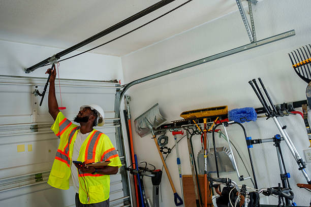 Professional Garage Door Panel Replacement technician working in Orleans, IN